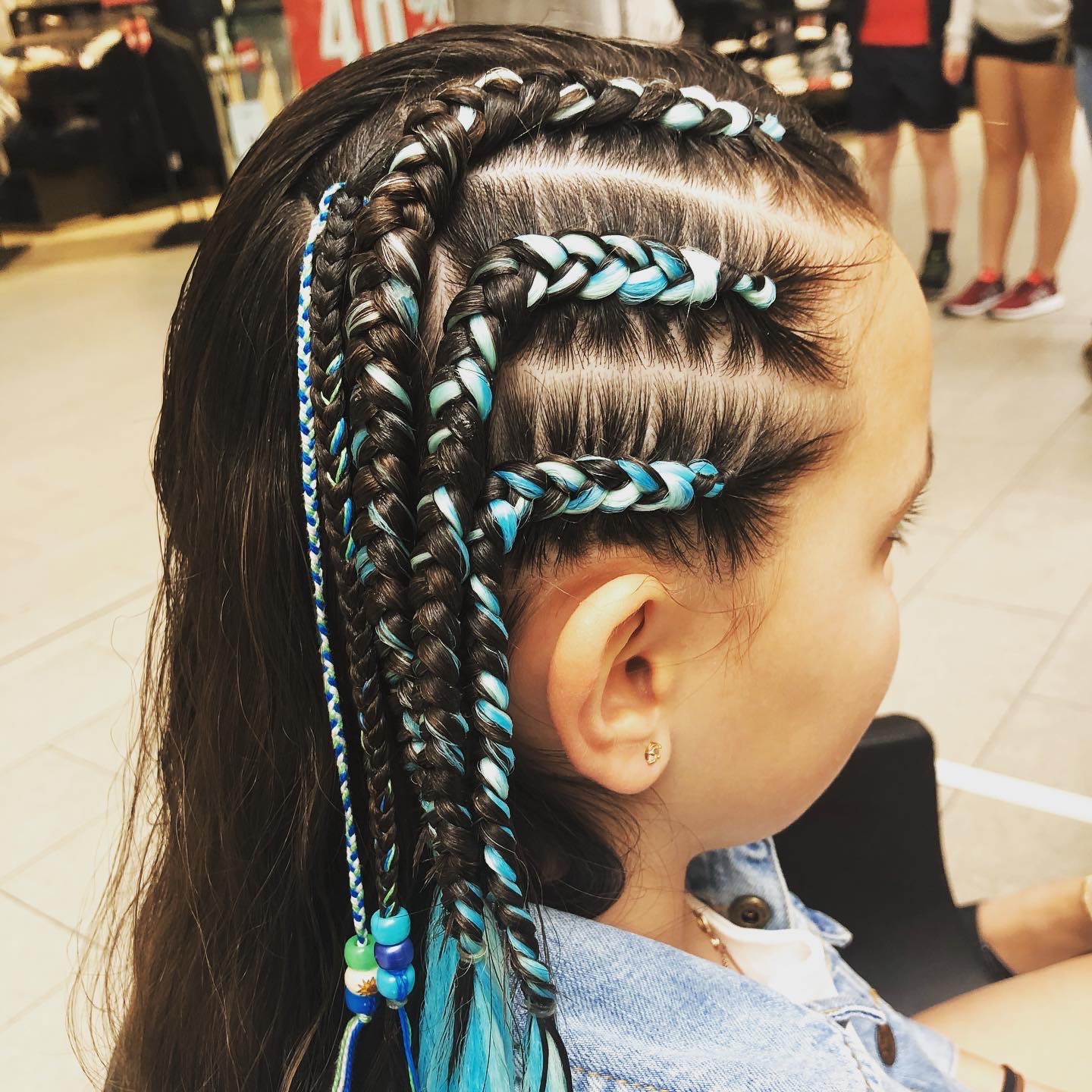 Cornrows on the side (with coloured extensions)