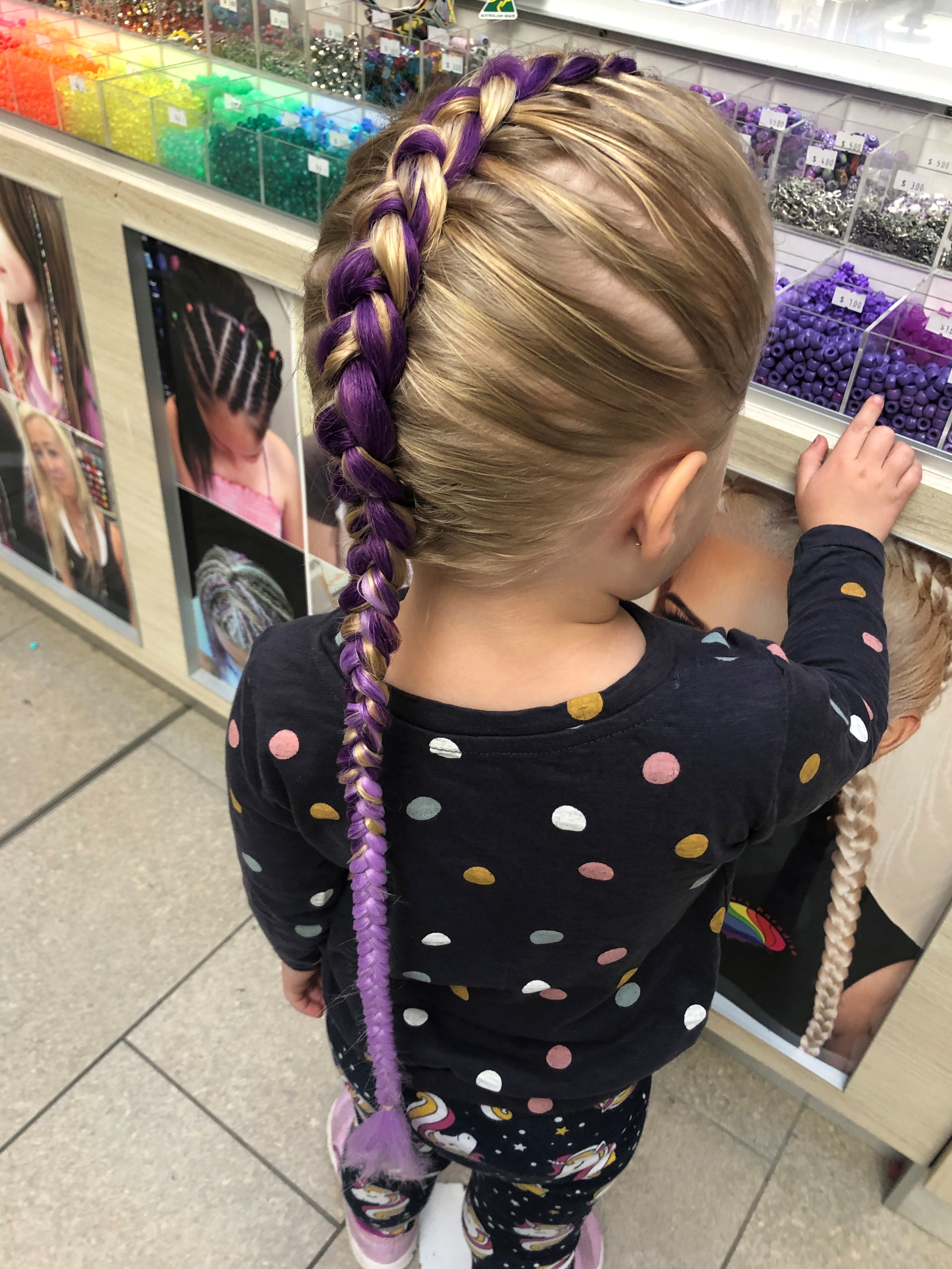 Single dutch braid over full head with extensions